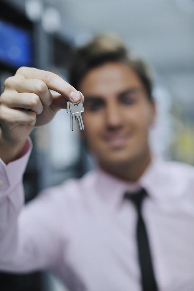 young it engineer in datacenter server room photo