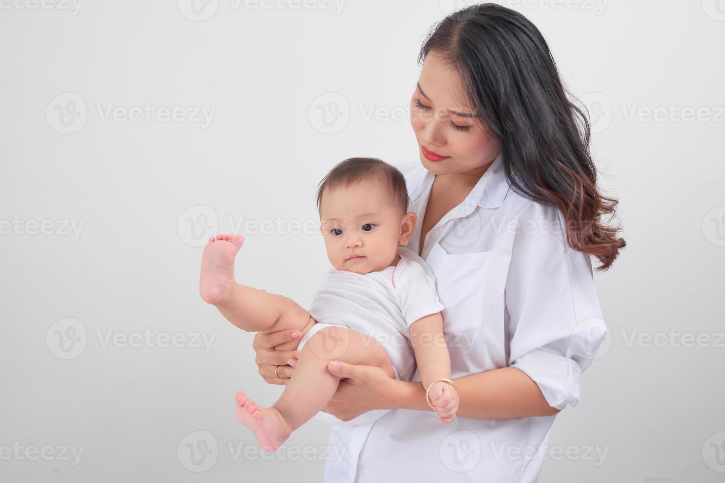 Beautiful woman with child photo
