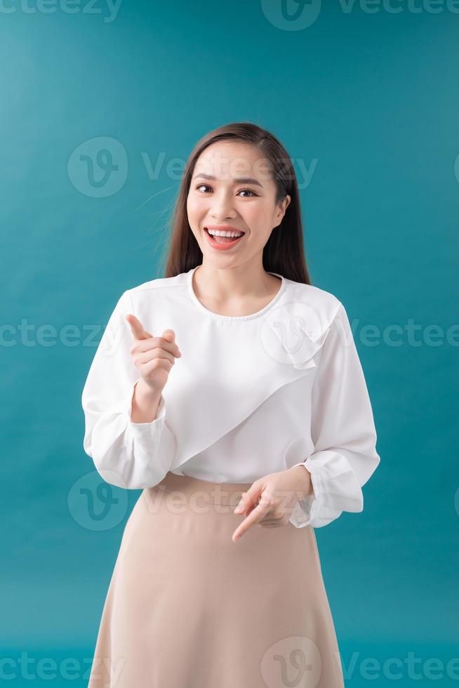 Asian woman pointing side photo