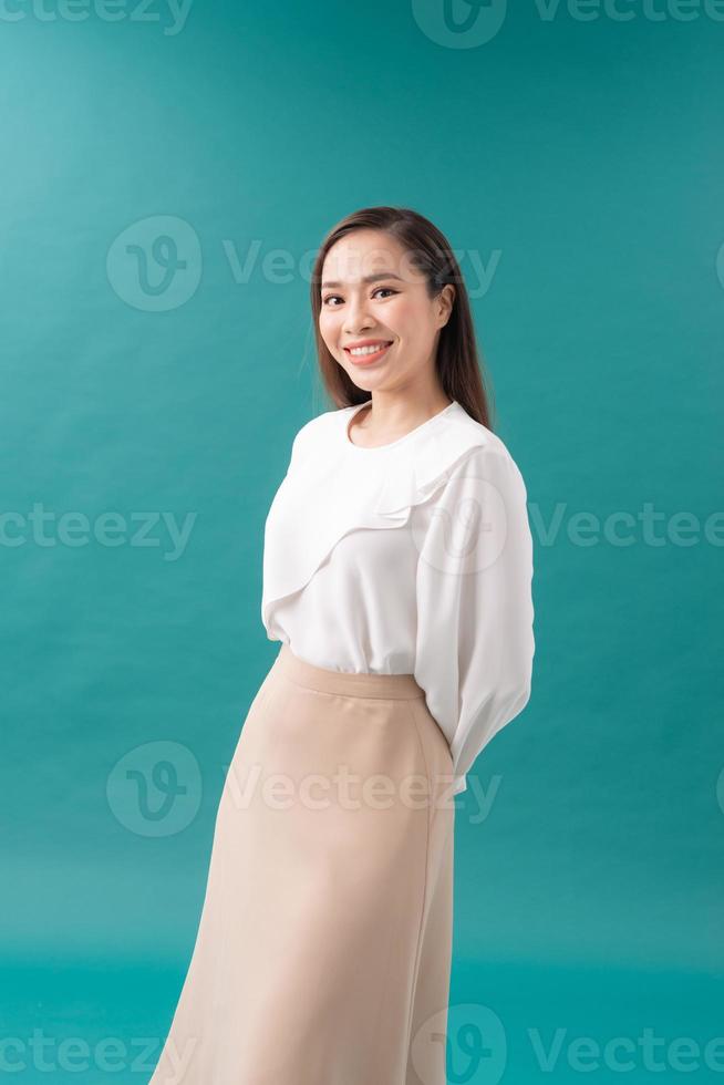 Successful business woman looking confident and smiling photo