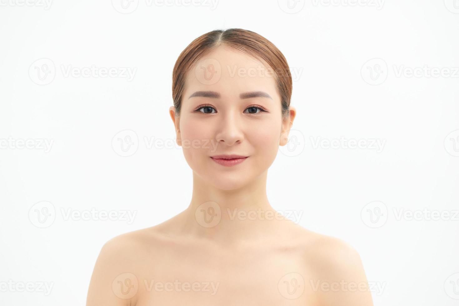 Asian woman beauty face healthy skin white background with natural makeup. Spa concept. photo