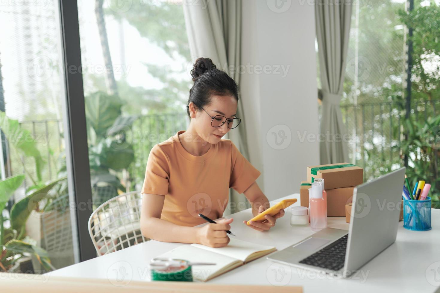 Tired woman preparing for home relocation photo