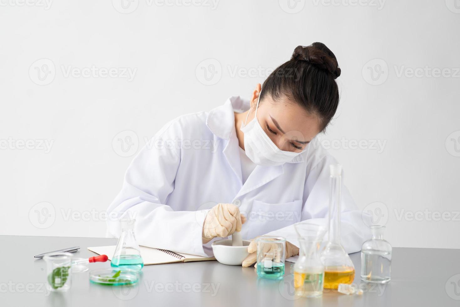 the scientist doctor making the herb alternative medicine. photo