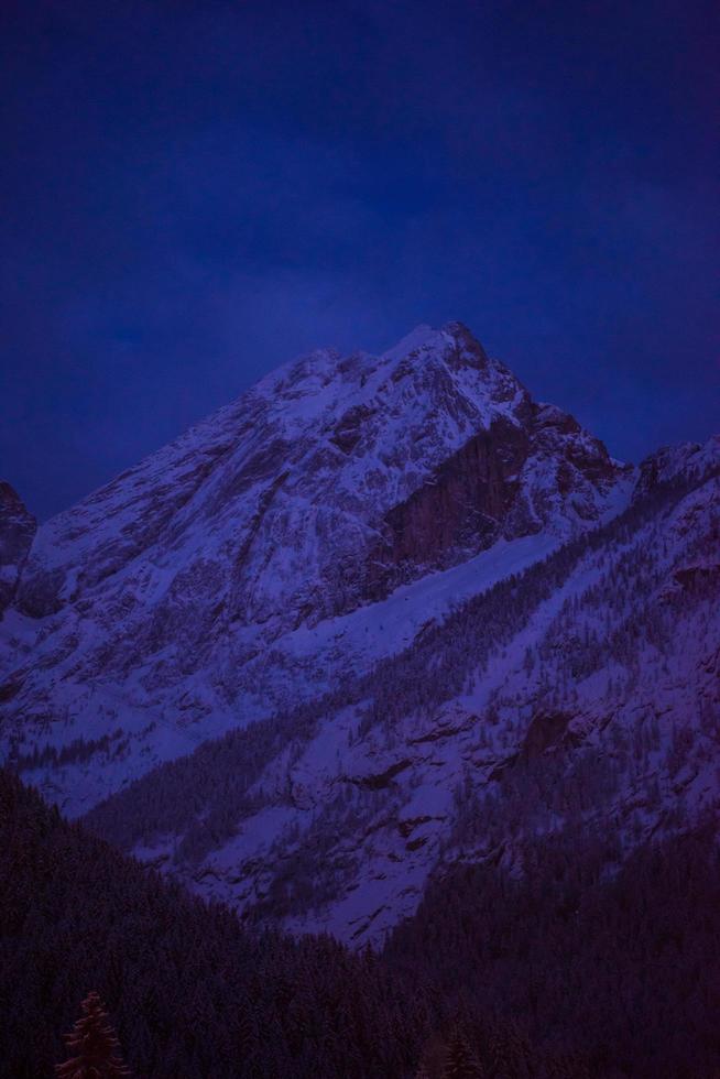 mountain village in alps  at night photo