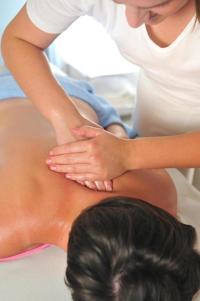 back massage at the spa and wellness center photo