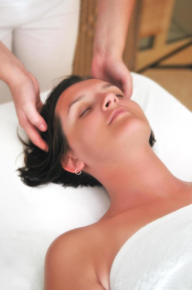 beautiful woman have massage at spa and wellness center photo