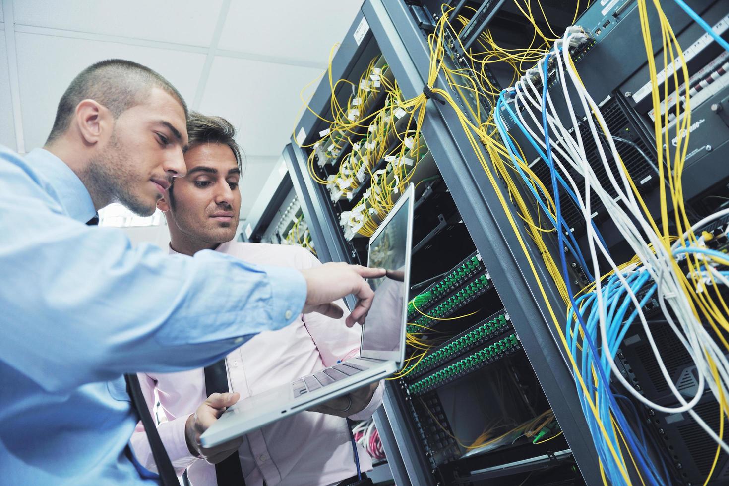 it enineers in network server room photo