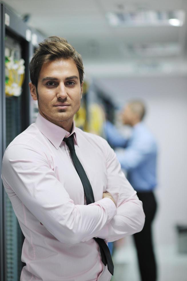 it engineers in network server room photo