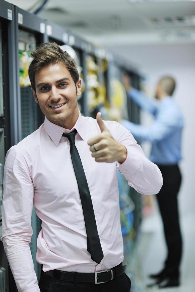 it engineers in network server room photo