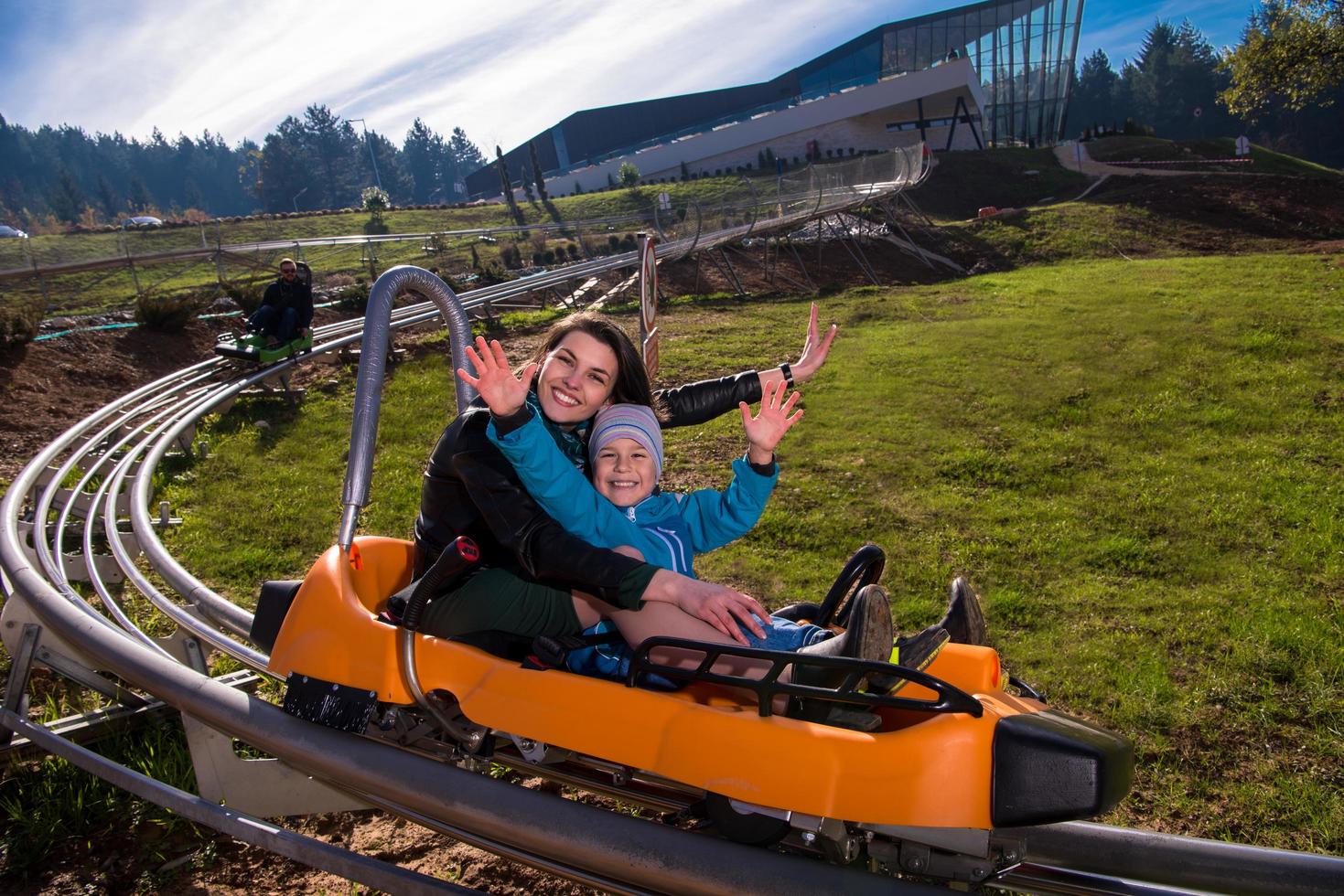 Croatia, 2022 - young mother and son driving alpine coaster photo