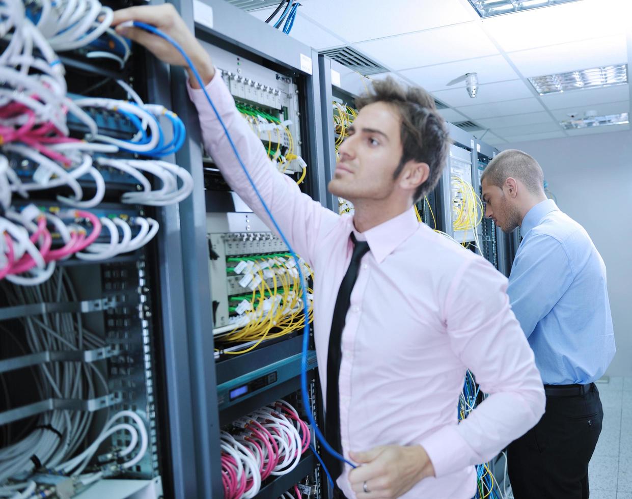 it enineers in network server room photo