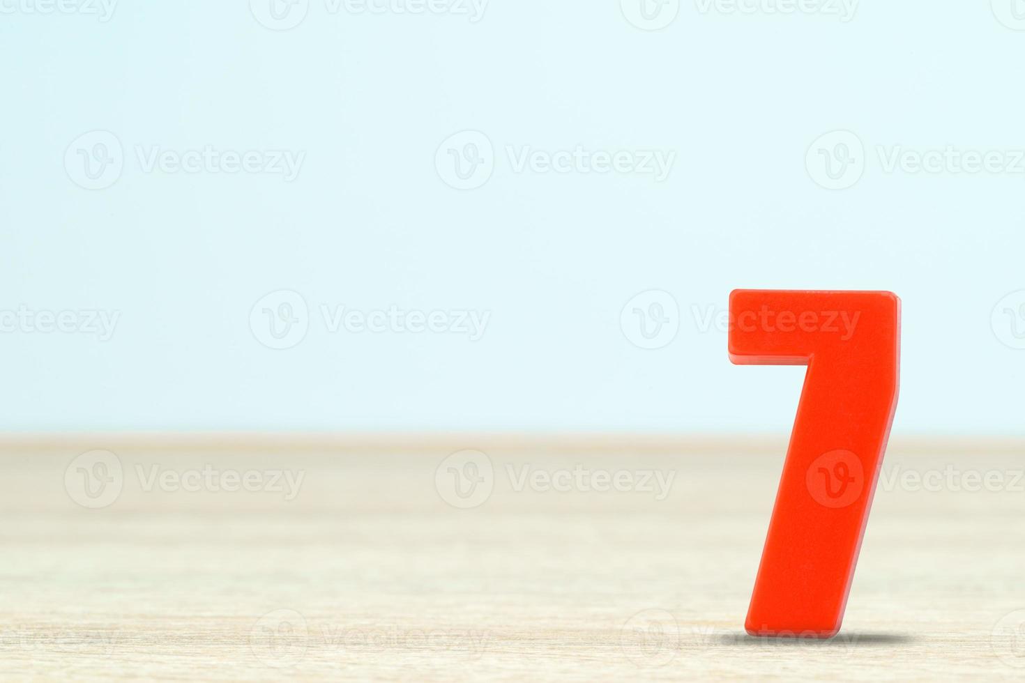 Shot of a number seven made of red plastic photo