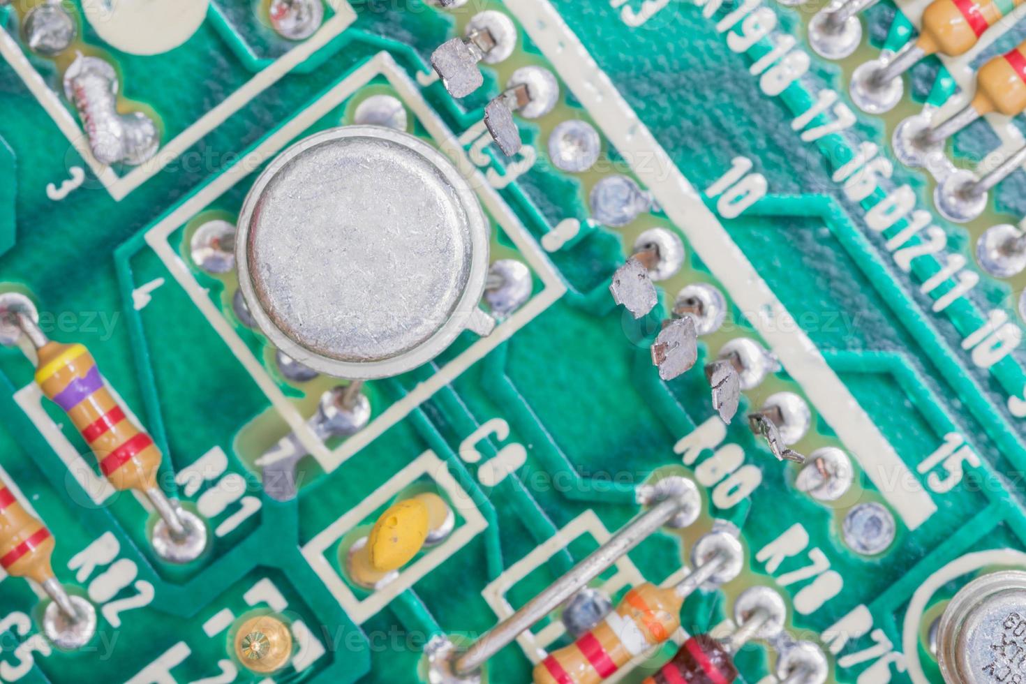 Condensers and Resistor assembly on the circuit board photo