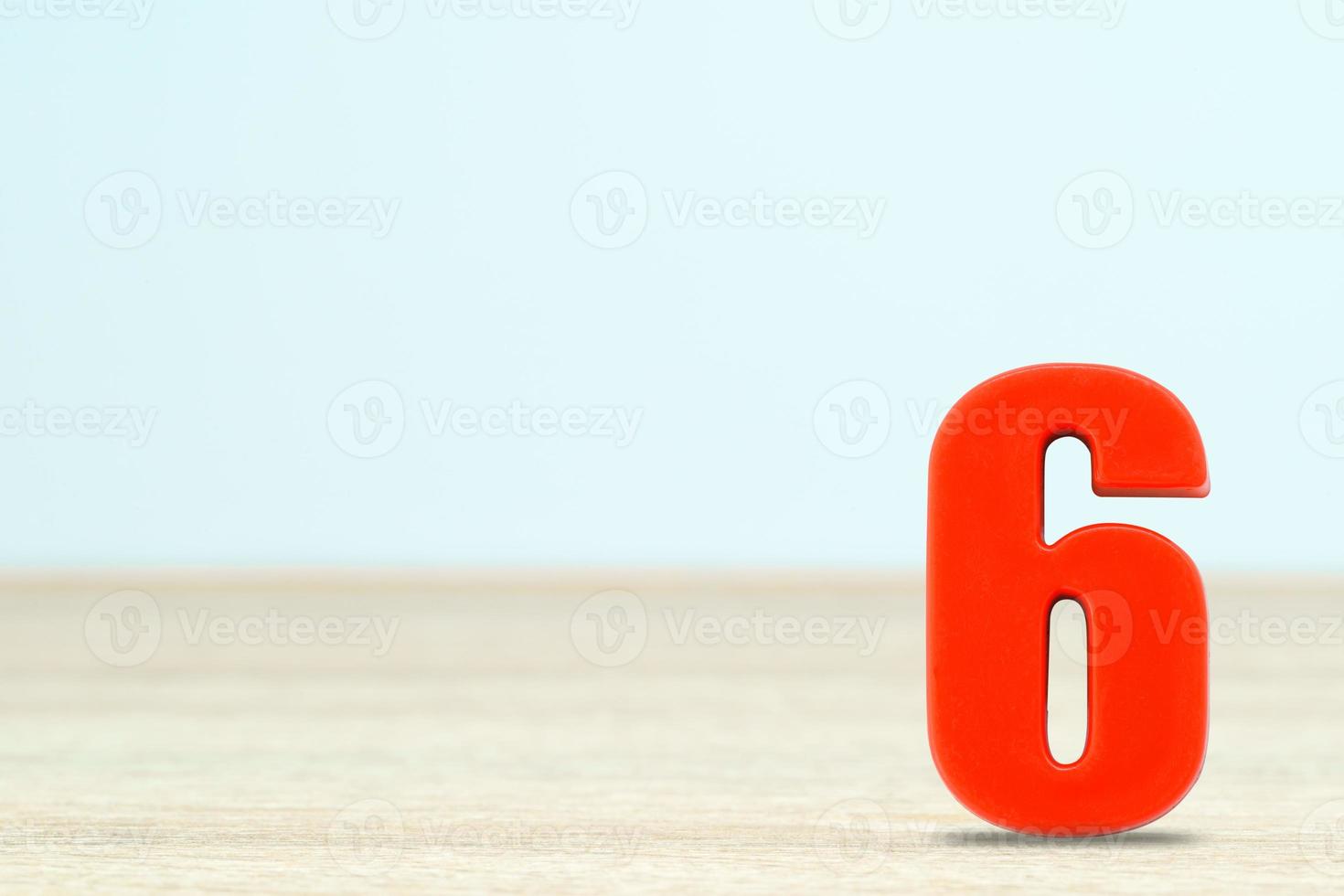 Shot of a number six made of red plastic photo