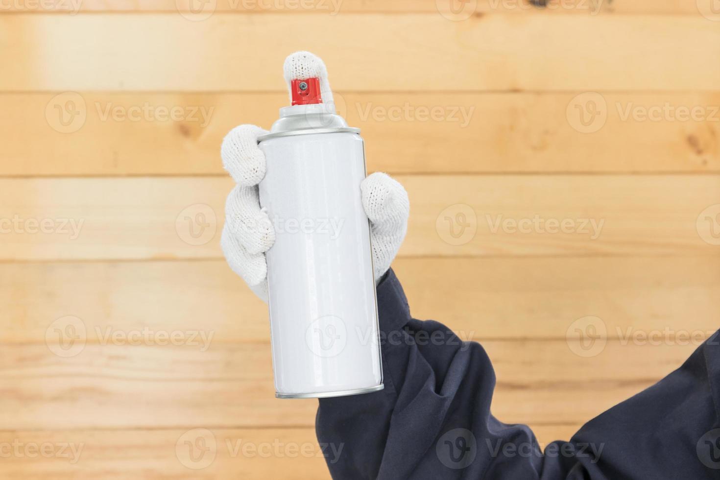 Hand holding spray paint can 11820531 Stock Photo at Vecteezy
