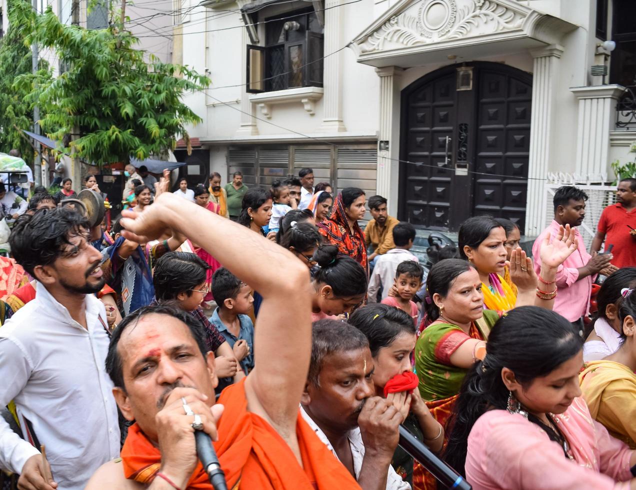 New Delhi, India July 01 2022 - A huge gathering of devotees from different parts of Delhi on the occasion of ratha yatra or rathyatra. Rath for Lord Jagannath pulled by people, Jagannath Rath Yatra photo