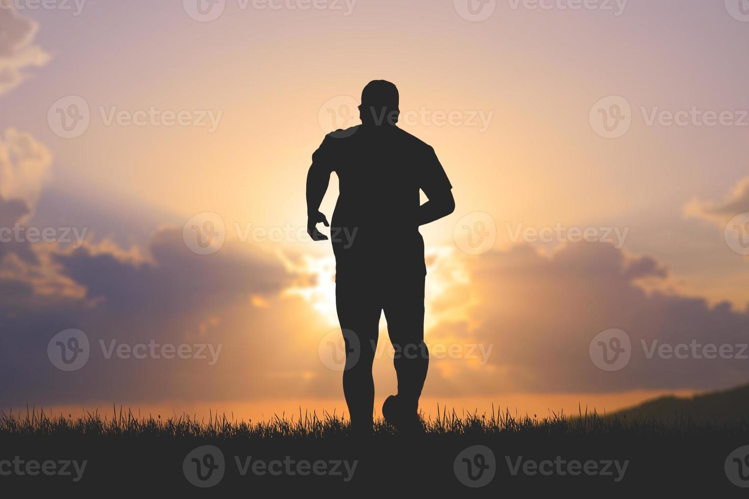 men's silhouette I am jogging to stay healthy in the evening. Men exercise by running. health care concept photo