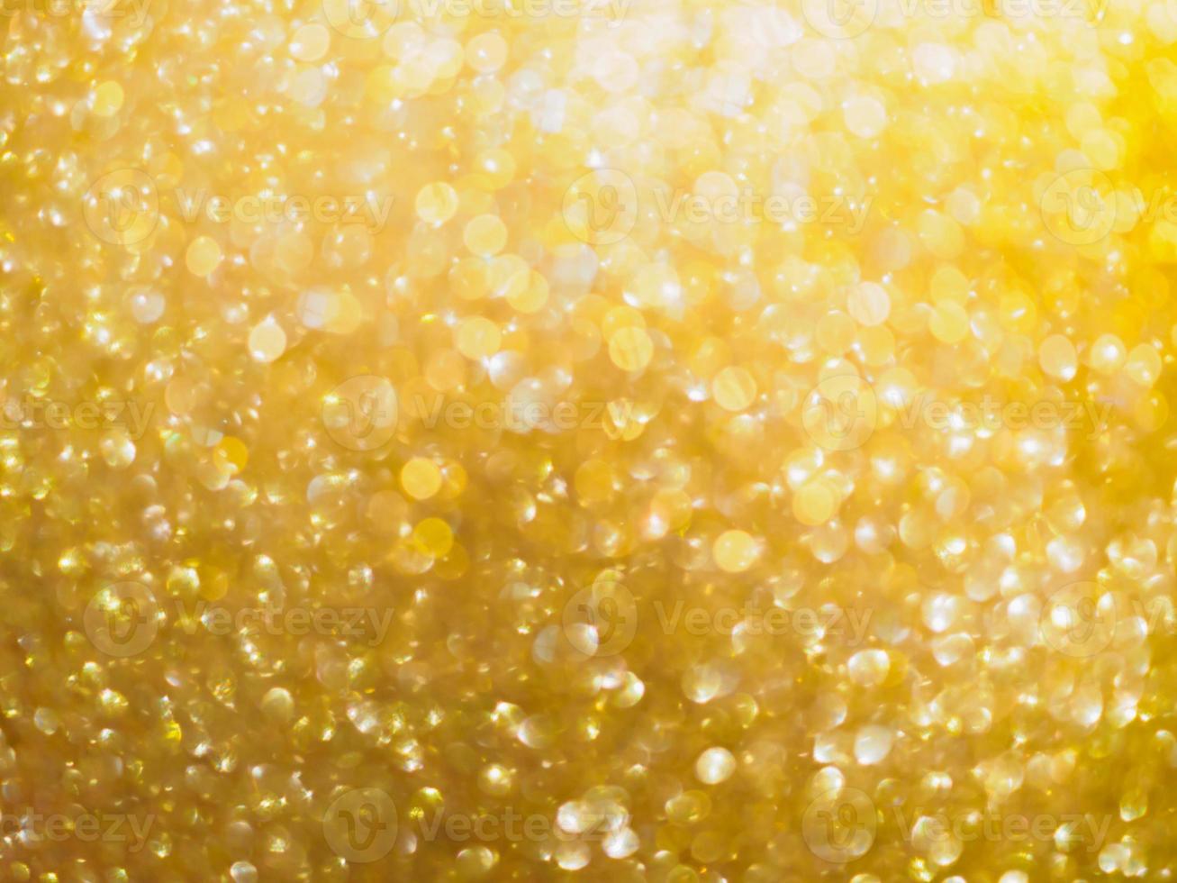 Christmas golden glow bokeh light blur abstract Background photo