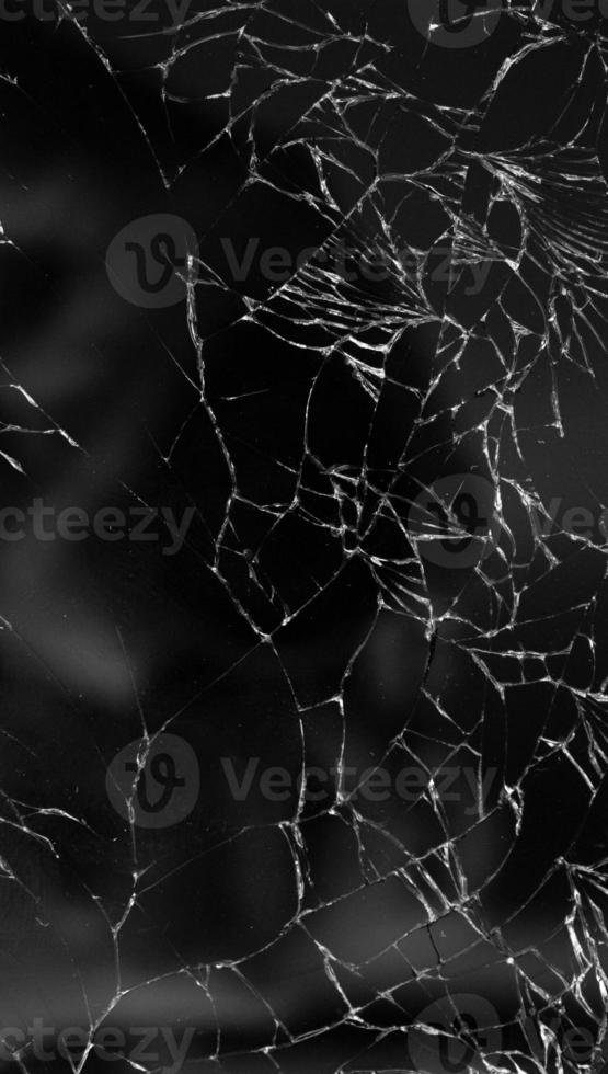 Broken glass texture background of mobile phone photo