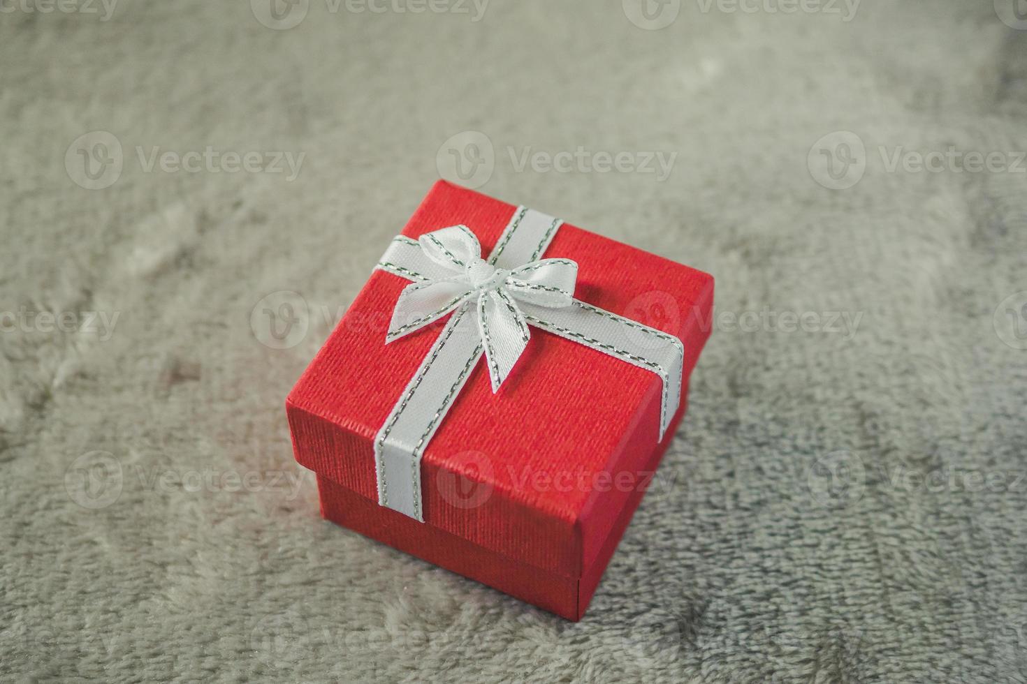 red gift box and white bow photo