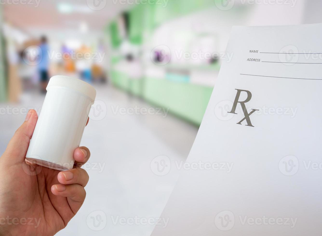 hand hold medical prescription at the hospital photo
