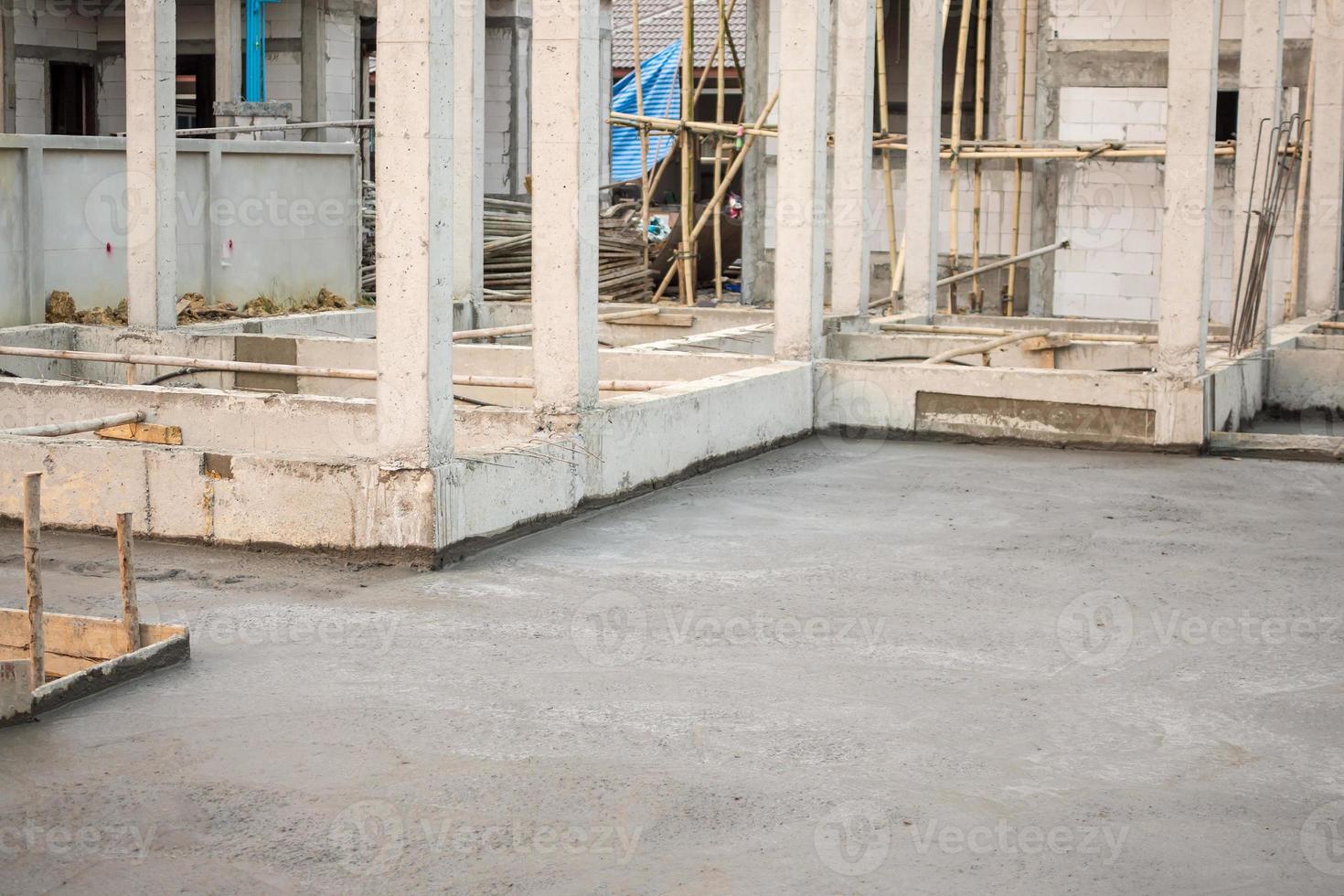 House building, concrete floor under construction photo