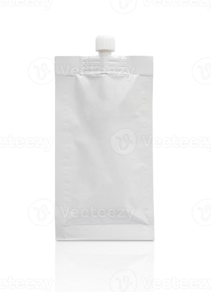 Blank white cosmetic cream sachet with plastic cap isolated on white background photo