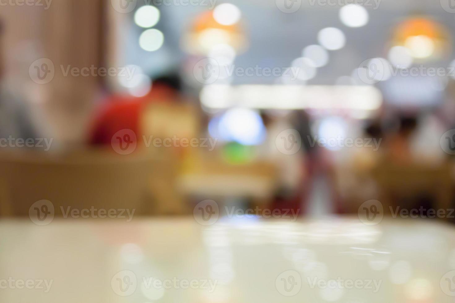 table top with blur cafe restaurant photo