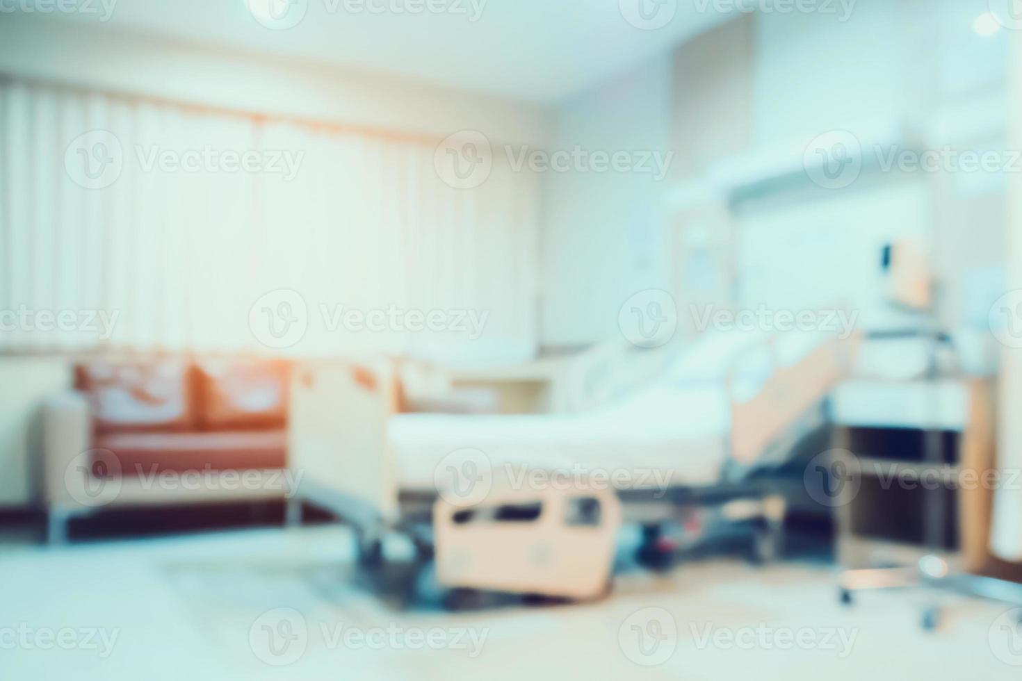 Desenfoque abstracto interior de la habitación del hospital con cama médica para el fondo foto