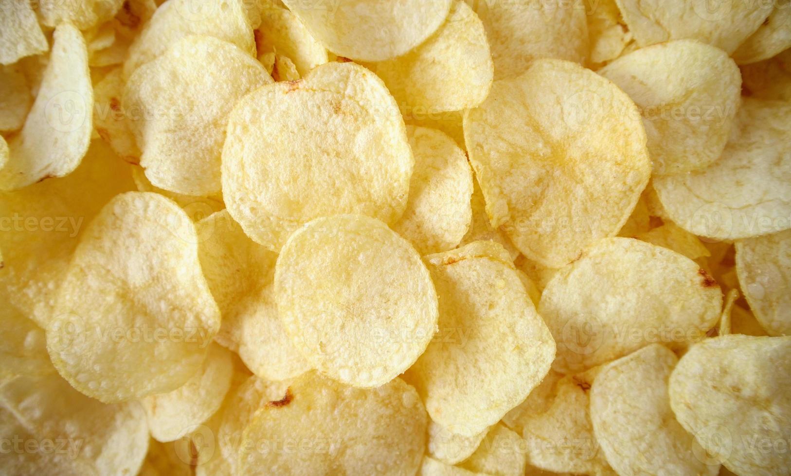 crispy potato chips snack texture background photo