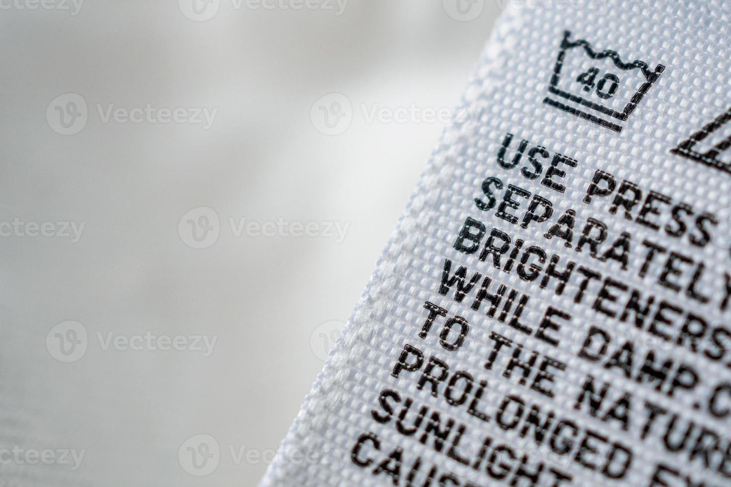 Cloth label tag with laundry care instructions photo