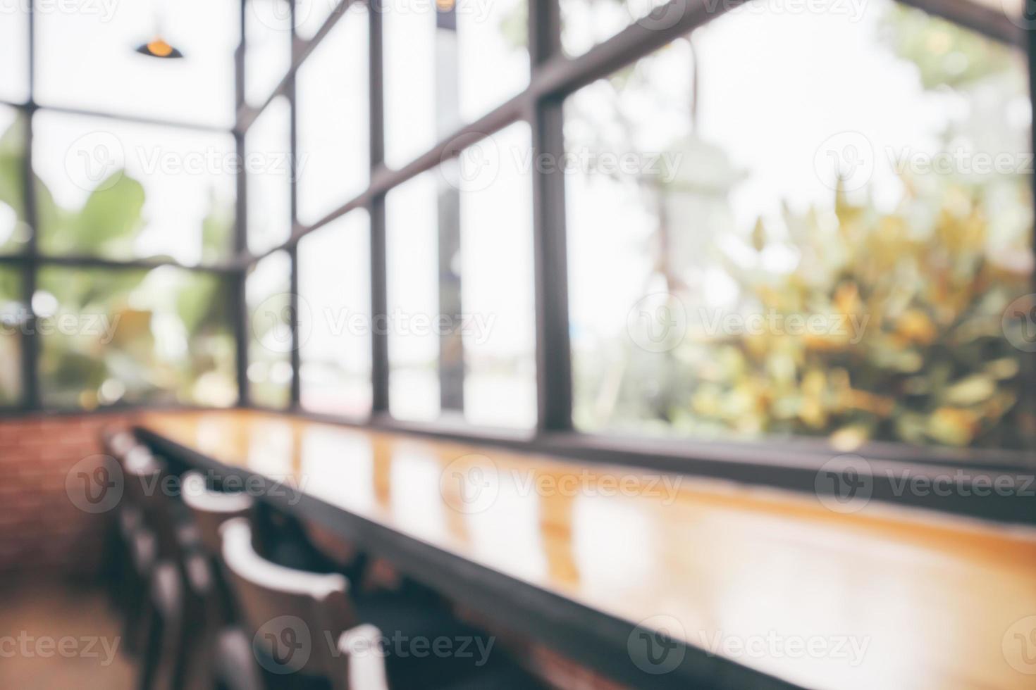 Cafe coffee shop interior abstract blur defocused with bokeh light background photo