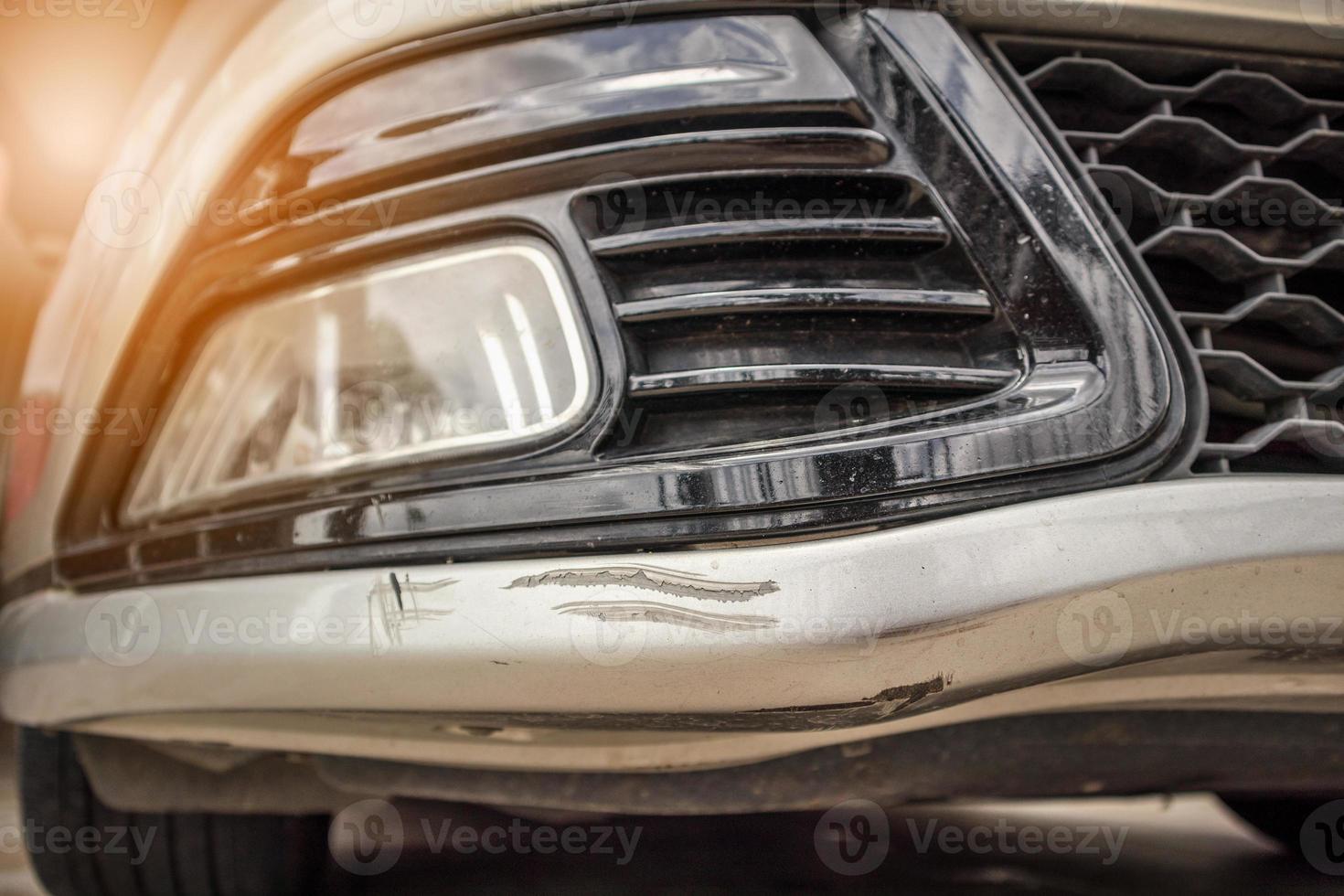 car bumper scratched paint damage photo