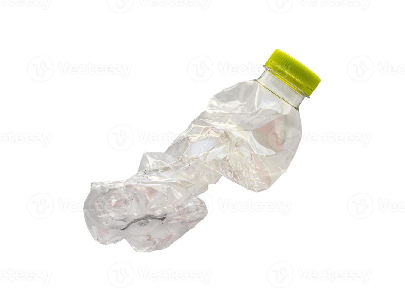 Crushed plastic bottle isolated on white background with clipping path photo