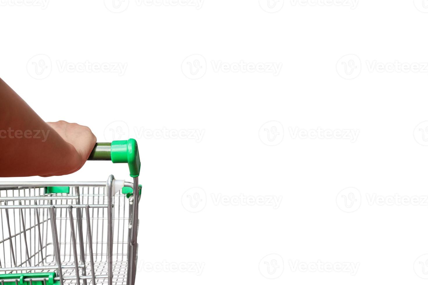 Hand hold shopping cart isolated on white background with clipping path photo