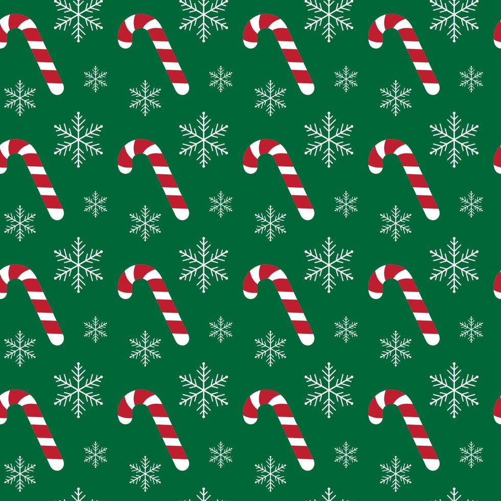 Christmas seamless pattern with candy canes and snowflakes on green