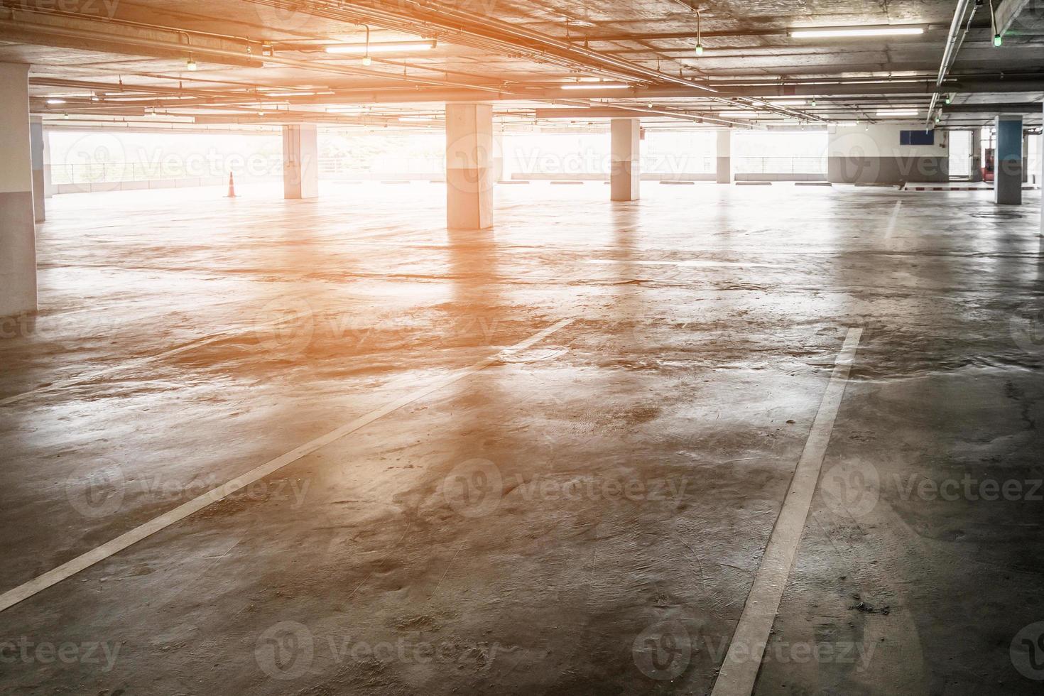 interior of empty vacant car parking garage in department store photo