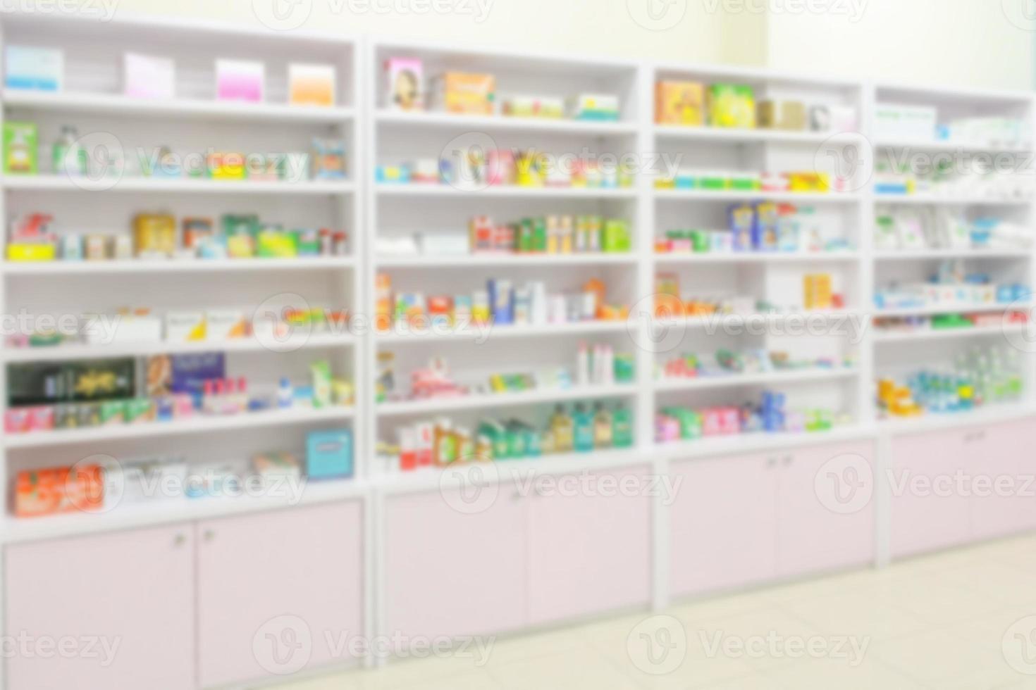 Pharmacy drugstore blur abstract backbround with medicine and healthcare product on shelves photo