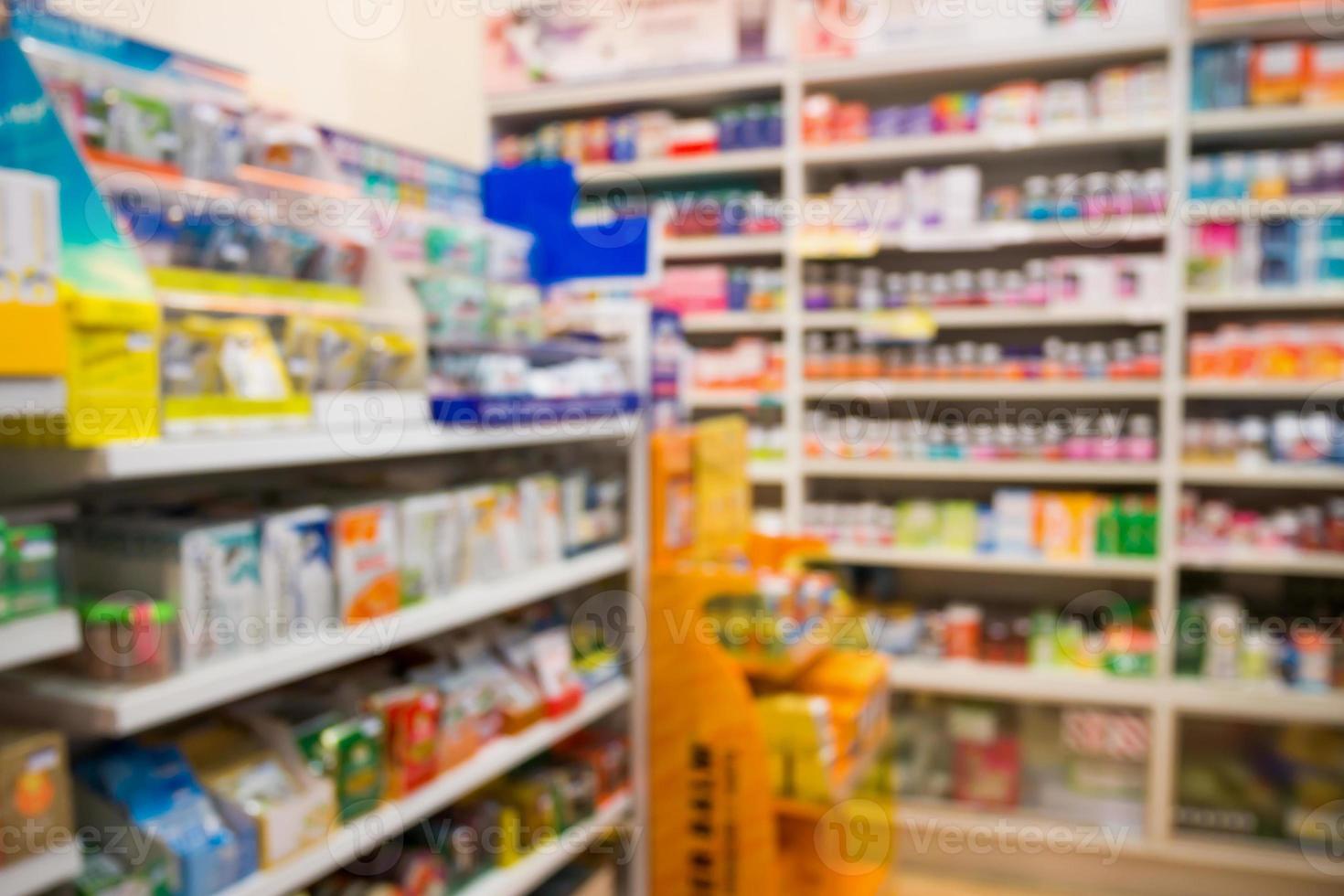 farmacia farmacia interior fondo borroso con medicina en estantes foto