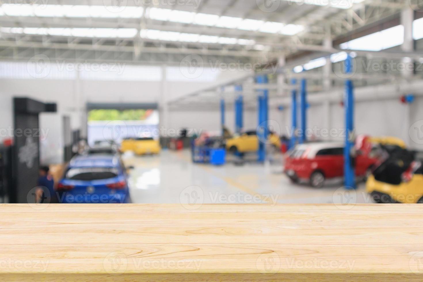 car service centre with auto at repair station bokeh light defocused blur background photo