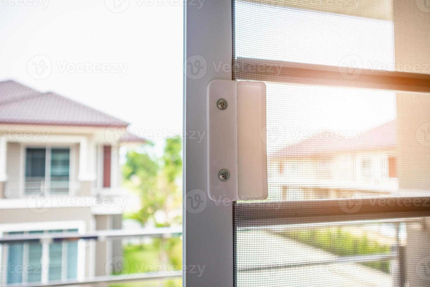 mosquito net wire screen on house window protection against insect photo