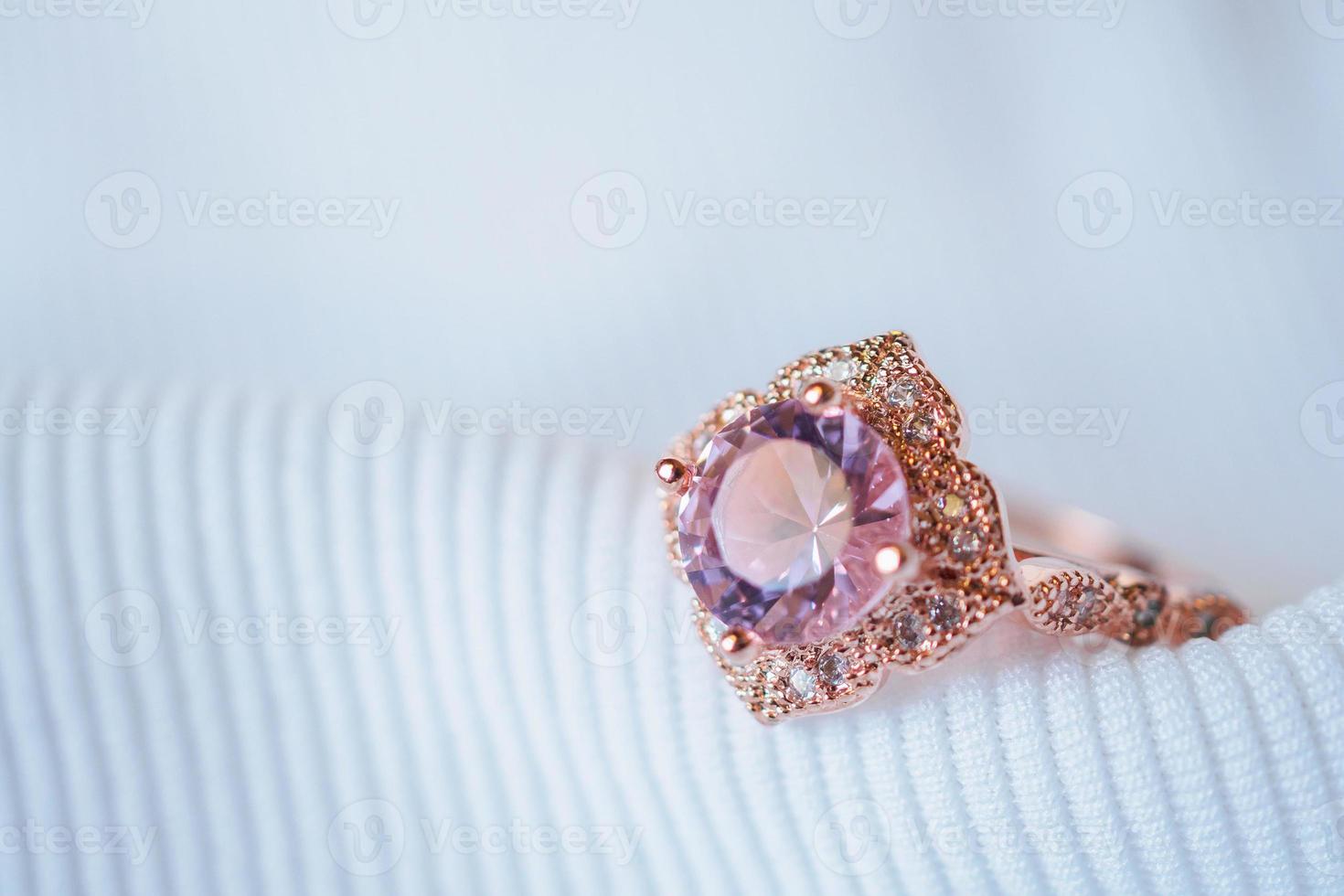 Jewelry luxury pink gold sapphire gemstone ring background photo