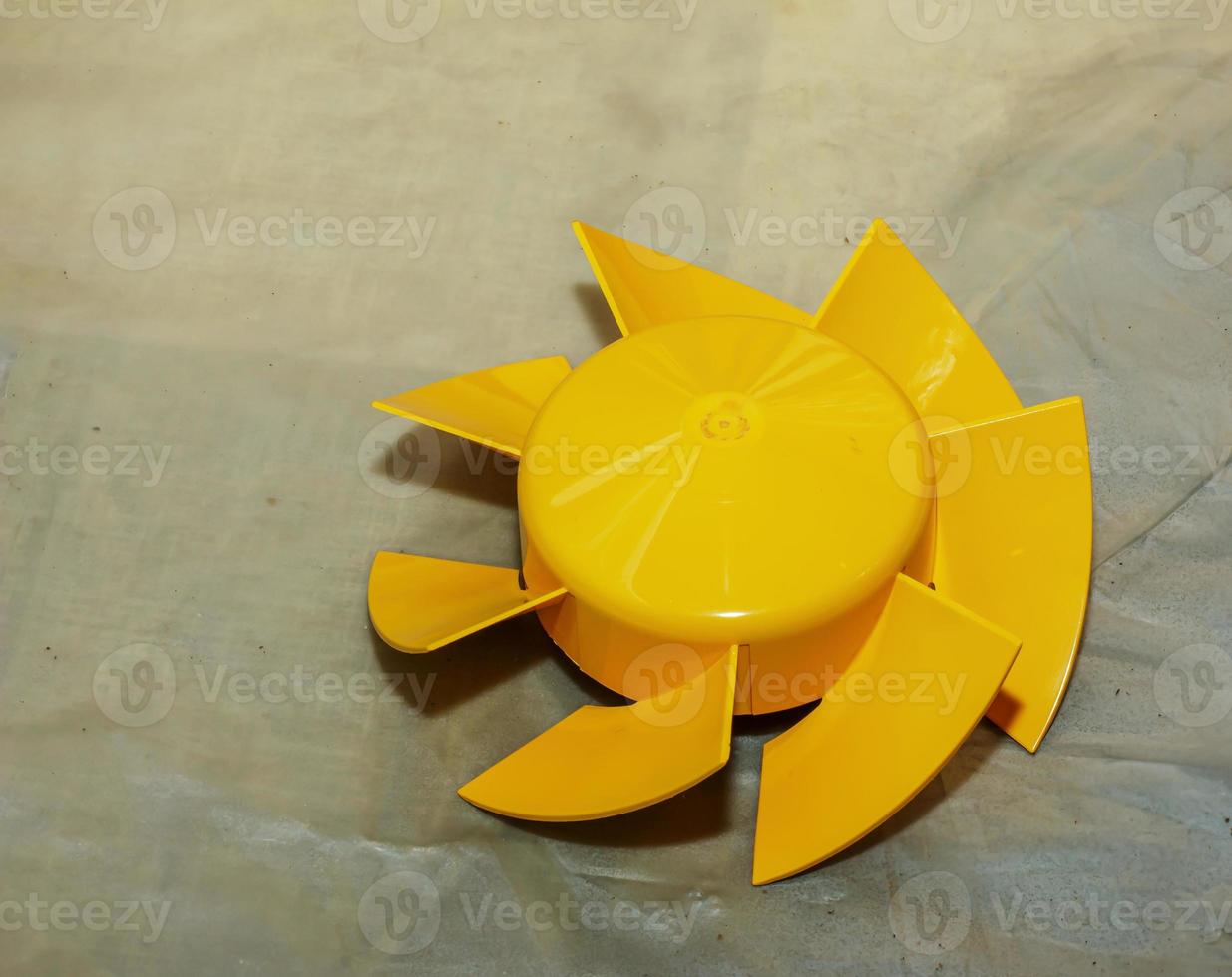 Parts of a kitchen exhaust fan after cleaning and washing. The process of cleaning a very dirty exhaust fan photo