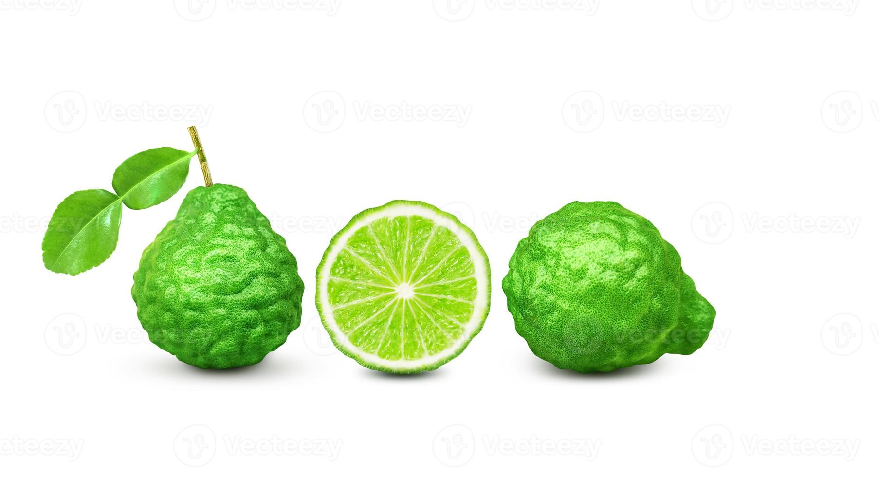 kaffir lime fruit with stems and leaves isolated on white background and space for text input photo