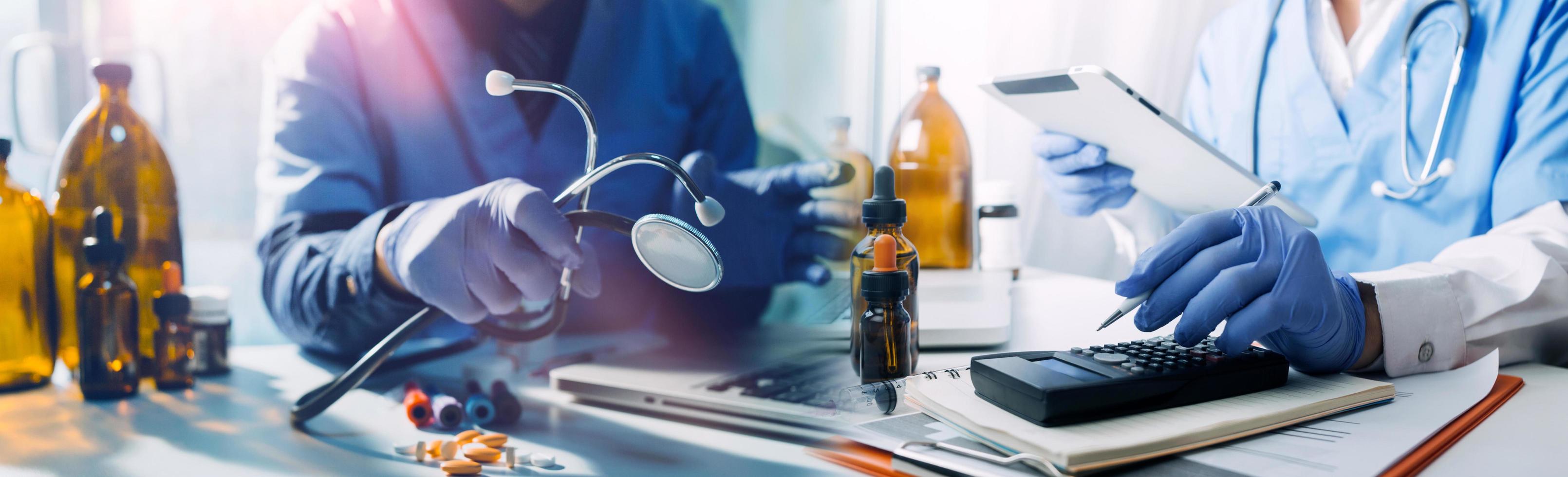Medicine doctor hand working on a patients x-ray scans digital healthcare and connection with modern virtual screen interface icons, Medical technology and network concept. photo