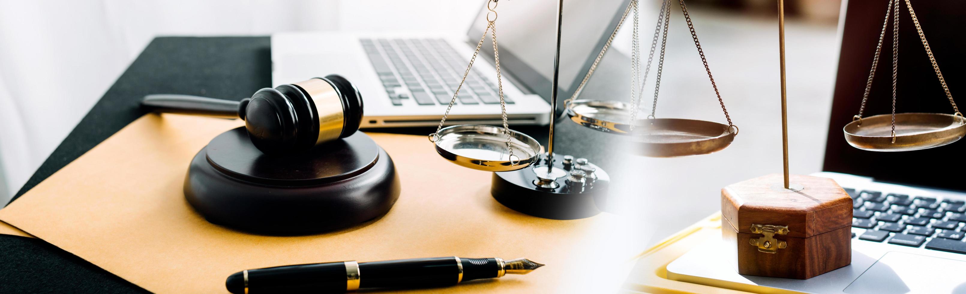 Business and lawyers discussing contract papers with brass scale on desk in office. Law, legal services, advice, justice and law concept picture with film grain effect photo