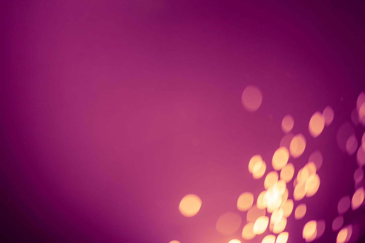 Dark purple Festive Christmas Beautiful abstract Background with bokeh lights. Holiday Texture with copy space. Can be used as Wallpaper, filling for a website, defocused photo