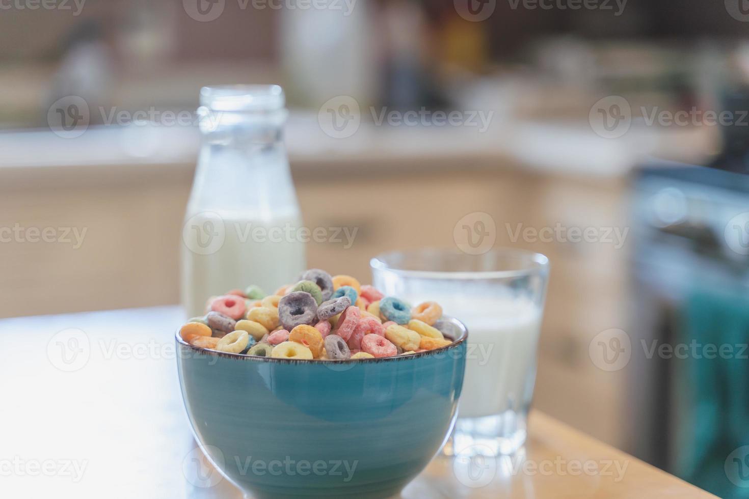 Reptientes with milk on a wooden table and rustic kitchen background. Alternative milk concept. Front view. Horizontal composition photo