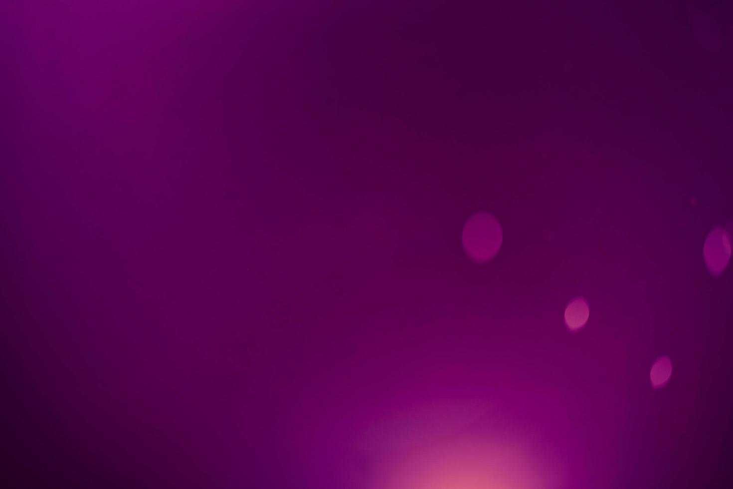 Dark purple Festive Christmas Beautiful abstract Background with bokeh lights. Holiday Texture with copy space. Can be used as Wallpaper, filling for a website, defocused photo