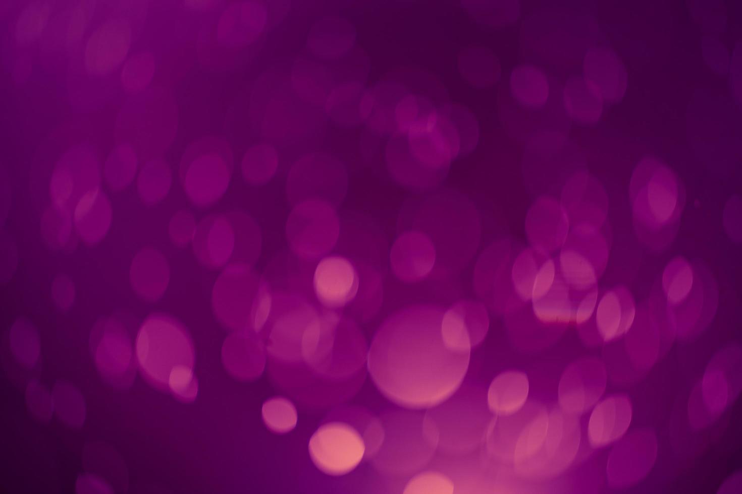 Dark purple Festive Christmas Beautiful abstract Background with bokeh lights. Holiday Texture with copy space. Can be used as Wallpaper, filling for a website, defocused photo